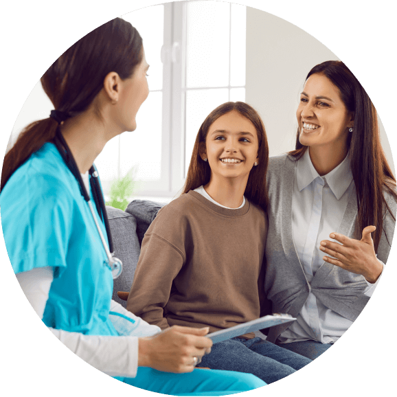 Actor portrayals of a female healthcare practitioner speaking with two female patients who appear to be mother and daughter